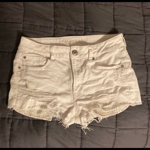American Eagle ripped white jean shorts